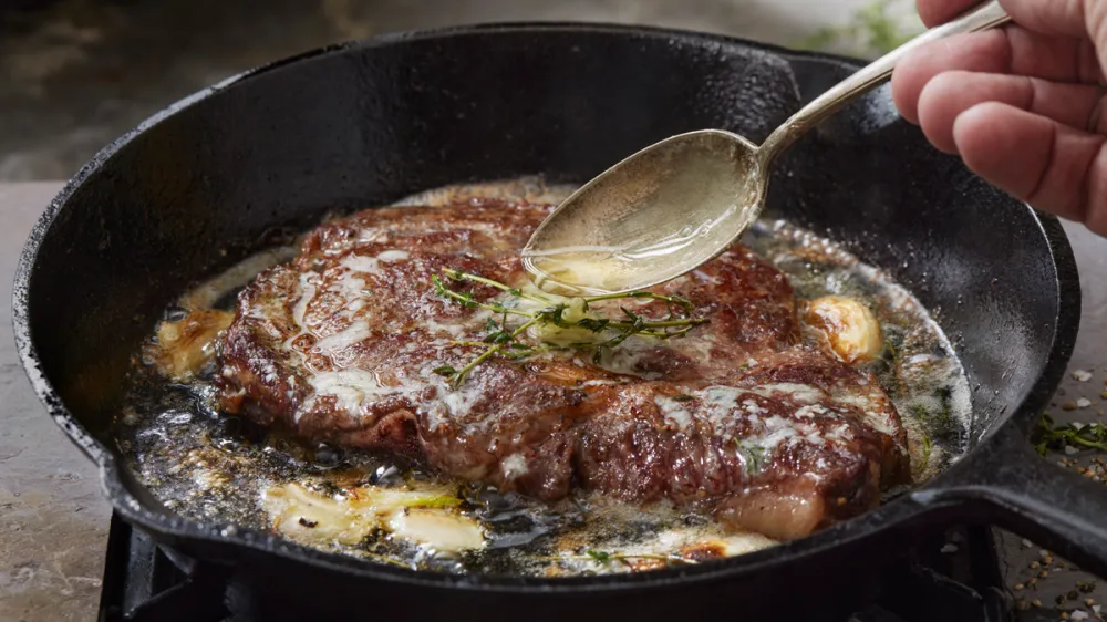 basting steak butter herbs